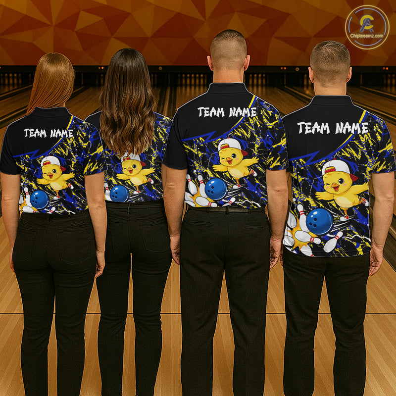 Four people wearing matching bowling shirts with a chicken graphic on a bowling alley.