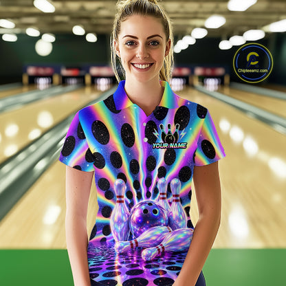 Women’s neon cosmic bowling polo shirt, front view on female model in bowling lane 