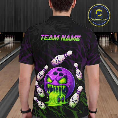 Person wearing a black bowling shirt with colorful designs and 'TEAM NAME' text in a bowling alley.