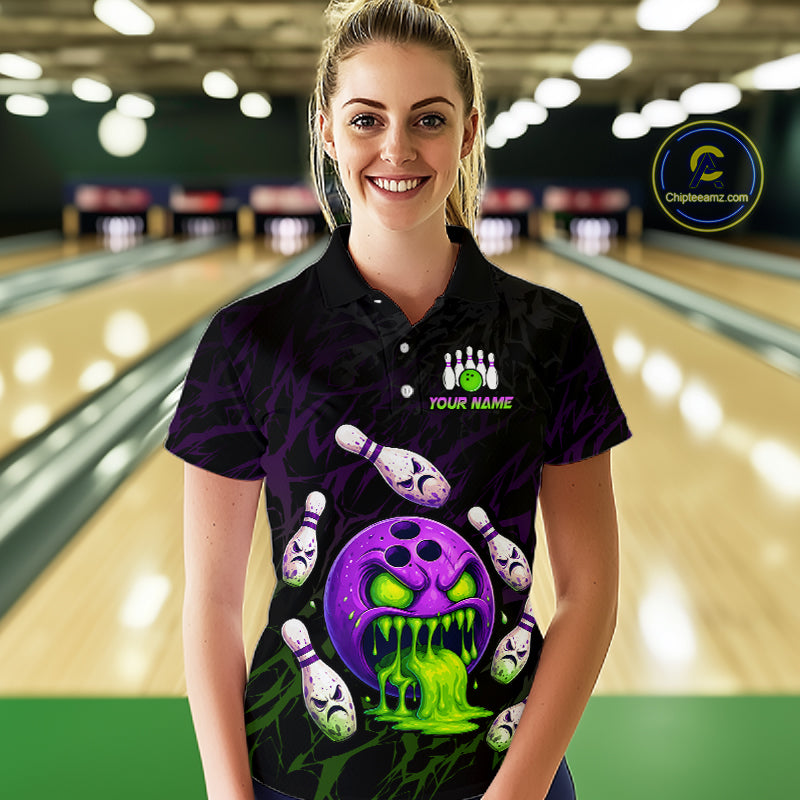 Person wearing a custom bowling shirt with a design and text in a bowling alley.