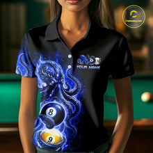 Load image into Gallery viewer, Black polo shirt with blue octopus design and pool ball elements on a blurred pool table background.