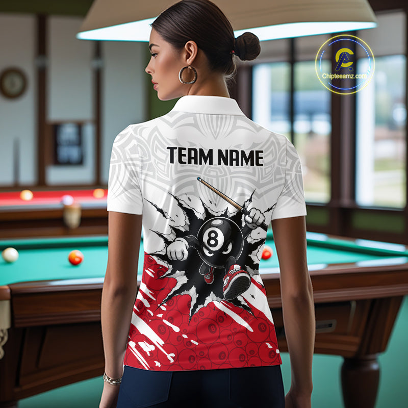 Person wearing a white polo shirt with a pool ball design and 'TEAM NAME' text in a billiards room.