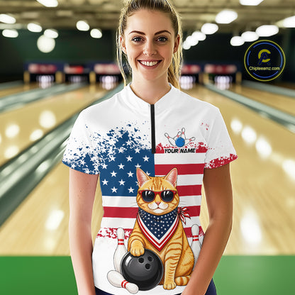 Women’s us flag cat bowling quarter zip shirt, front view on female model in bowling lane 