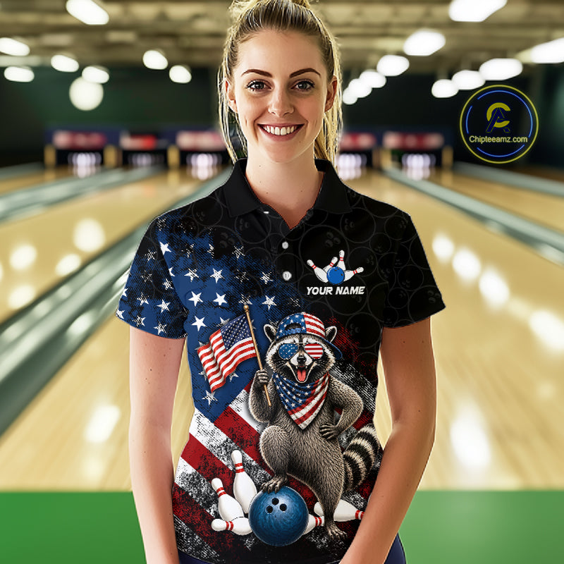 Women’s us flag raccoon bowling polo shirt, front view on female model in bowling lane 