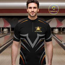 Load image into Gallery viewer, Man wearing a black bowling shirt with a logo and text in a bowling alley.