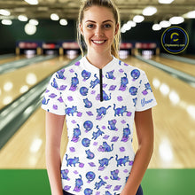 Load image into Gallery viewer, Woman wearing a white shirt with blue cat pattern in a bowling alley