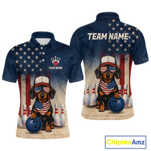 Load image into Gallery viewer, Navy blue polo shirt with a dachshund holding a bowling ball and American flag design, featuring 'Chiptee Amz' branding.