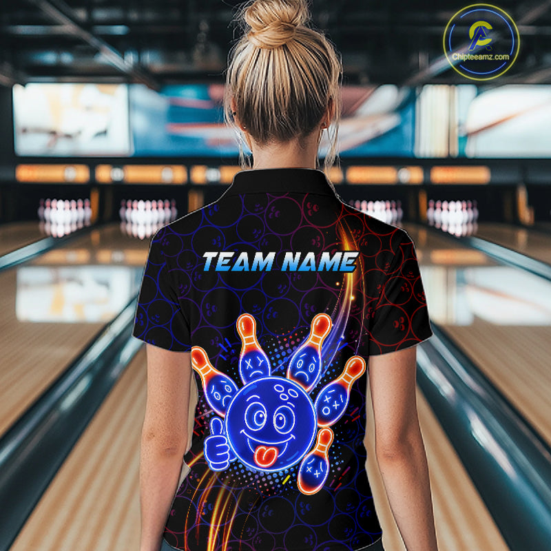 Woman wearing of a black bowling polo shirt with neon blue and orange cartoon bowling ball and pin graphics, plus custom team name text.