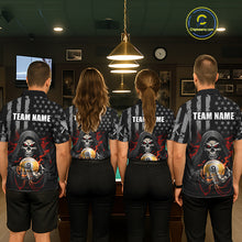 Load image into Gallery viewer, Four people wearing matching shirts with a skull and number 9 design in a bar setting.