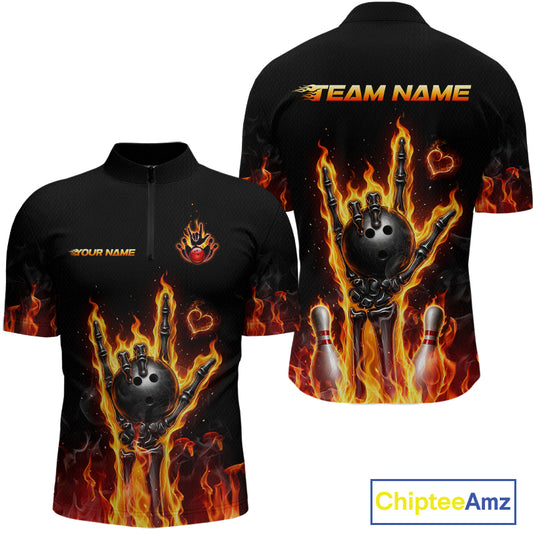 Black short-sleeve quarter-zip performance shirt shown from front and back with a bowling-themed flame graphic featuring a bowling ball, pins, and fiery orange flames. Custom text placeholders 'TEAM NAME' and 'YOUR NAME' are printed on the back and chest.