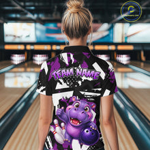 Load image into Gallery viewer, Woman wearing of a black, white, and purple bowling quarter zip shirt featuring a cheerful purple hippo holding a bowling ball, with custom player name text.