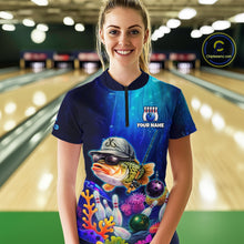 Load image into Gallery viewer, Woman wearing an underwater-themed bowling quarter zip featuring a fish mascot wearing sunglasses and a cap, colorful coral reefs, bowling pins, bowling balls, and custom your text.