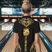 Load image into Gallery viewer, Women wearing personalized bowling quarter zip shirt with a crowned bowling ball centered among geometric gold patterns across a black layout.