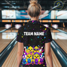 Load image into Gallery viewer, Women wearing personalized bowling polo shirt with cartoon chicks holding bowling balls, framed by pins and colorful paint patterns on a black layout.