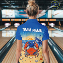 Load image into Gallery viewer, Person wearing a blue bowling shirt with a colorful design and 'TEAM NAME' text in a bowling alley.