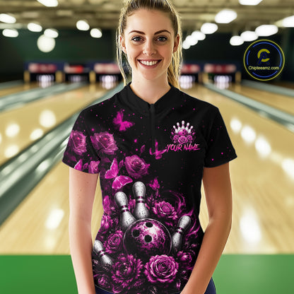 Women’s pink rose butterfly bowling quarter zip shirt, front view on female model in bowling lane 