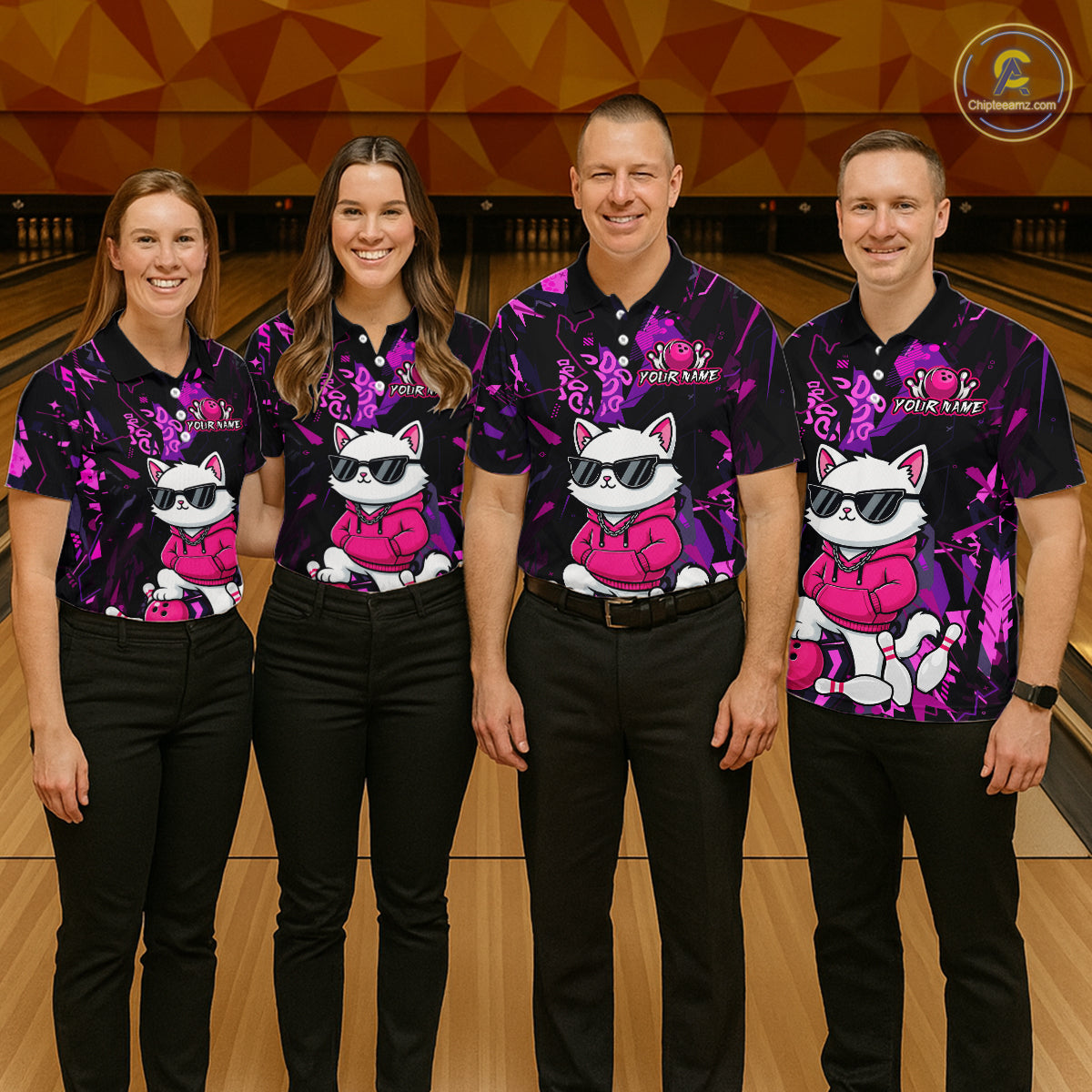 Four people standing together in a bowling alley wearing matching black and purple bowling shirts with a cartoon cat graphic and the words 'I Love Foxtrot'.