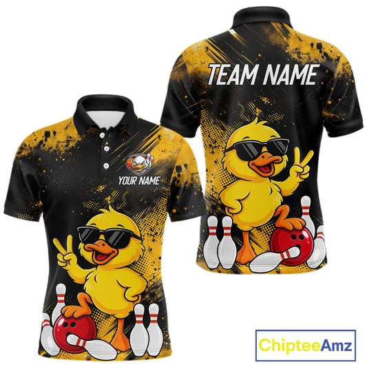 Front and back views of a short-sleeve polo shirt featuring a cartoon yellow duck wearing black sunglasses, with bowling pins, bowling balls, and black-and-yellow splatter graphics. The front shows placeholder text 'YOUR NAME' and the back shows 'TEAM NAME'.