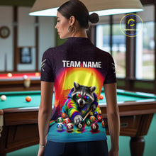 Load image into Gallery viewer, Person wearing a shirt with a raccoon playing pool design in a billiards room.