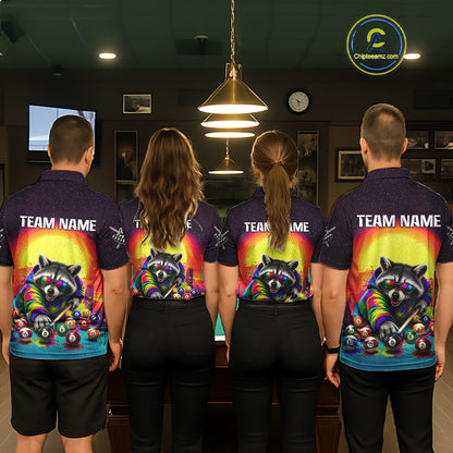 Four people wearing matching shirts with a colorful raccoon design in a pool hall.