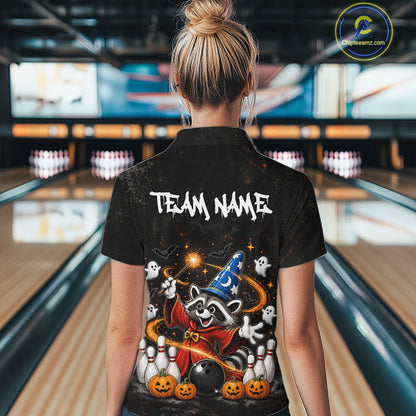 A woman viewed from behind wearing a black short-sleeve collared shirt with a large Halloween-themed graphic on the back. The shirt features the text 'TEAM NAME' in white above a raccoon dressed as a wizard with ghosts, pumpkins, and bowling pins.