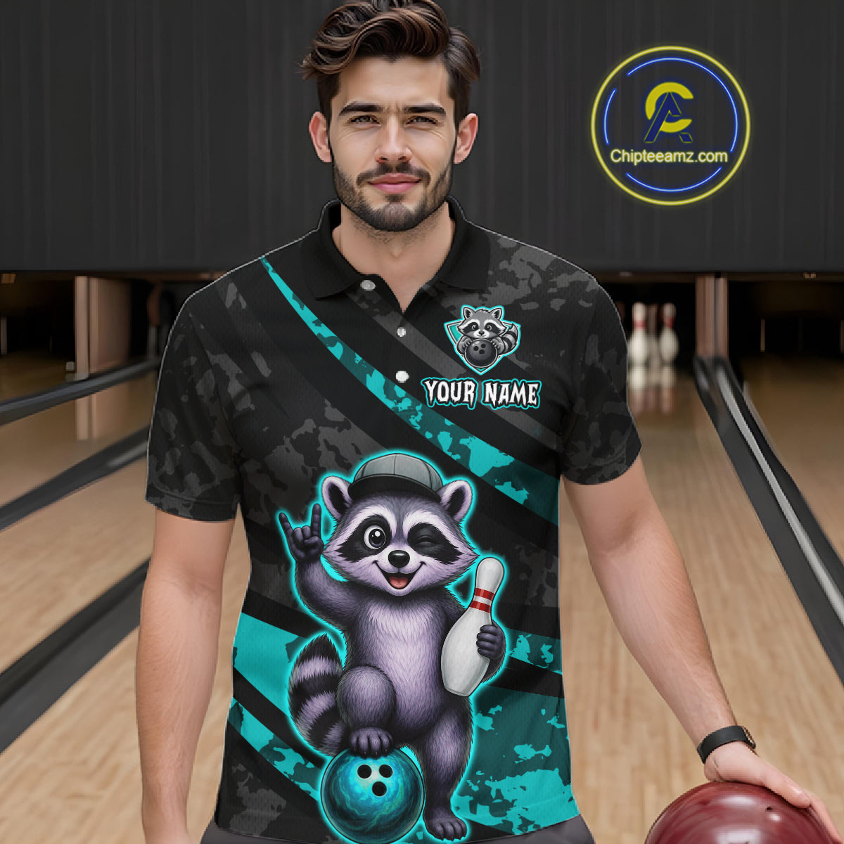 Man wearing a bowling-themed shirt with a raccoon design on a bowling alley.