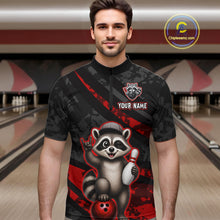Load image into Gallery viewer, Man wearing a black bowling shirt with a raccoon graphic in a bowling alley.