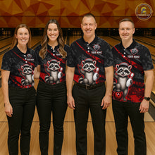 Load image into Gallery viewer, Four people wearing matching bowling shirts with raccoon graphics on a bowling alley background.