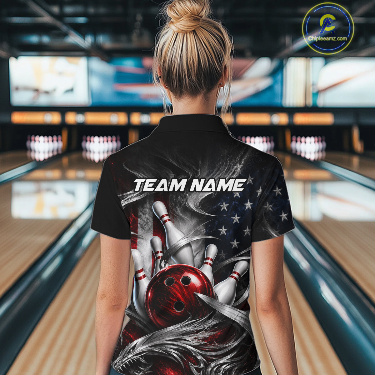 A woman viewed from behind wearing a black short-sleeve polo shirt with a bowling-themed graphic print on the back. The design features a red bowling ball, white bowling pins, a stylized hand, and an American flag motif with the text 'TEAM NAME'.