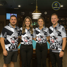 Load image into Gallery viewer, Four people wearing matching polo shirts with cow designs in a bar setting.