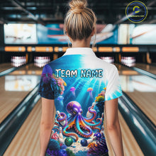 Load image into Gallery viewer, Woman wearing a colorful shirt with an octopus design in a bowling alley.