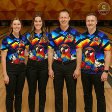 Load image into Gallery viewer, Four people standing together in a bowling alley wearing matching colorful bowling shirts with parrot graphics and black pants. A bowling lane and wooden pins are visible in the background.