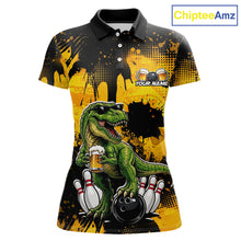 Load image into Gallery viewer, Front view bowling polo shirt featuring a dinosaur holding beer with bowling pins and ball artwork on black yellow background.