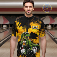 Load image into Gallery viewer, Man wearing a black bowling quarter zip featuring a green T-Rex wearing sunglasses, holding a beer mug, standing with bowling pins and a bowling ball, plus personalized name and team name text.