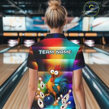 Load image into Gallery viewer, Woman wearing a colorful bowling quarter zip featuring a shocked rooster chicken, blue bowling ball, surprised pins, and custom team name text.