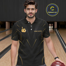 Load image into Gallery viewer, Men wearing personalized bowling polo shirt with a crowned bowling ball accent paired with gold line patterns across a black layout.