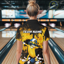 Load image into Gallery viewer, Woman wearing a black and yellow bowling polo featuring a cool banana mascot dabbing, bowling pins, a blue bowling ball, and custom team name text.