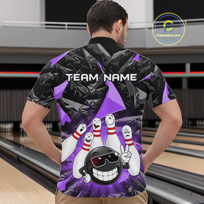 A man viewed from behind wearing a short-sleeve bowling-themed polo shirt with a black and purple abstract pattern, cartoon bowling pins, a bowling ball character, and the text 'TEAM NAME' on the back. The shirt is shown in a bowling alley setting.