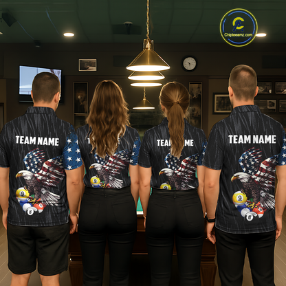 Four people standing with their backs to the camera in a pool room, wearing matching dark blue pinstriped short-sleeve shirts with a patriotic eagle design on the back, white 'TEAM NAME' text, and colorful billiard balls near the graphic.