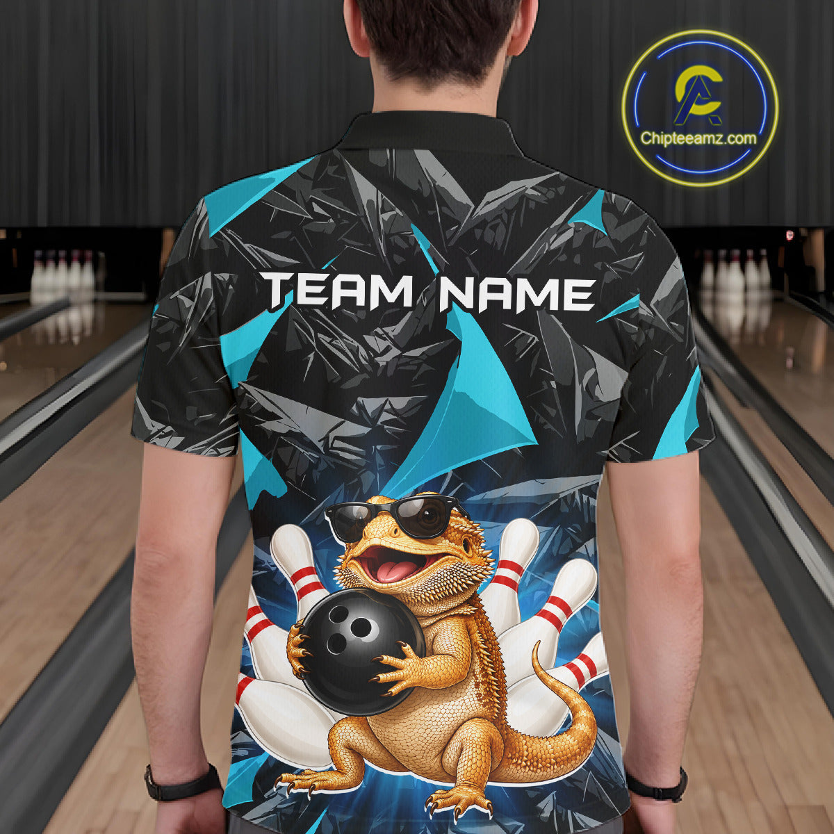Men’s turquoise bearded dragon bowling polo shirt, back view on male model in bowling lane 
