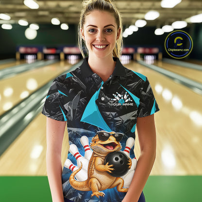 Women’s turquoise bearded dragon bowling polo shirt, front view on female model in bowling lane 
