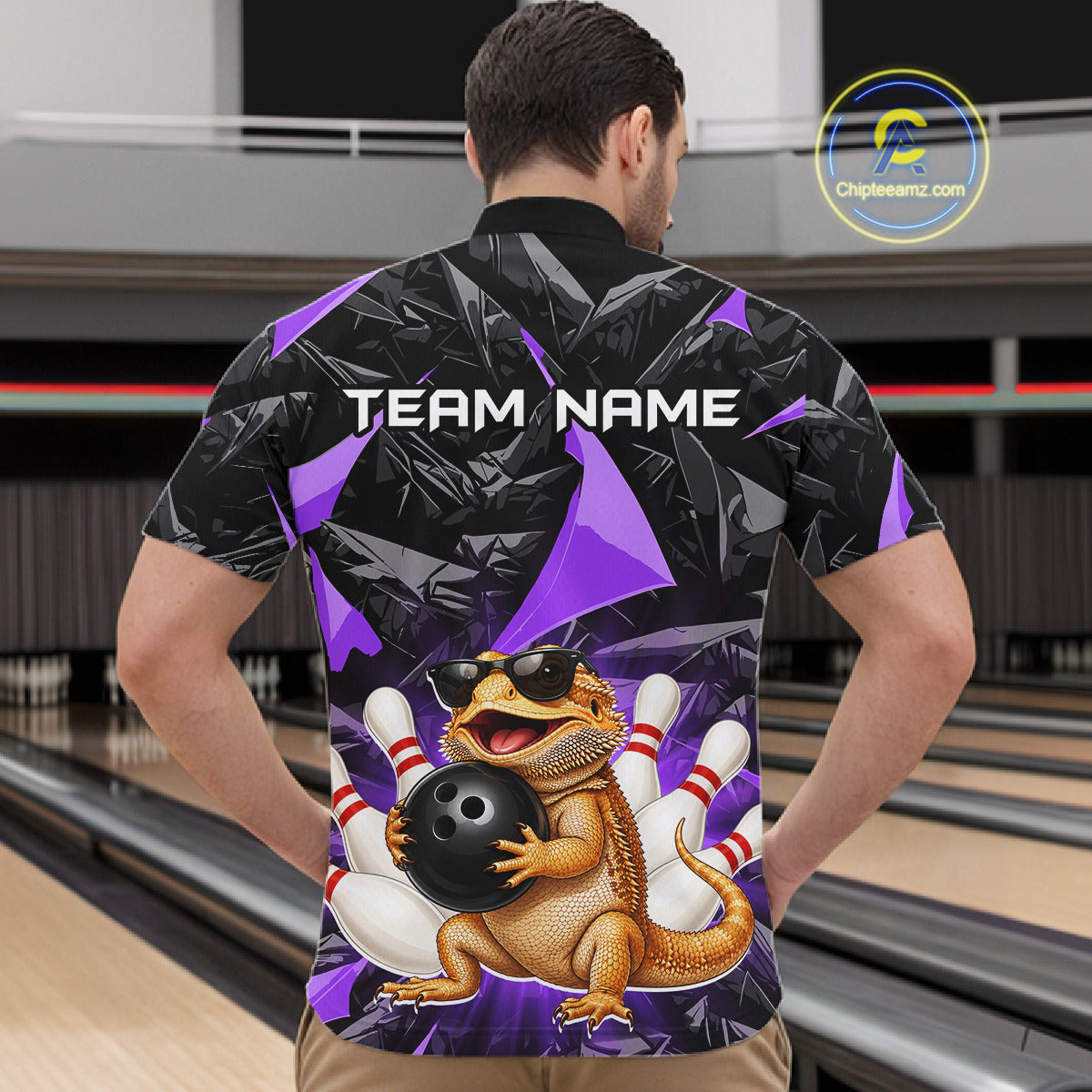 Men’s purple bearded dragon bowling quarter zip shirt, back view on male model in bowling lane 