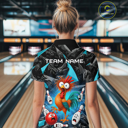 A woman viewed from behind wearing a short-sleeve bowling shirt with a black and gray geometric pattern, bright blue accents, and a colorful cartoon rooster graphic on the back. The shirt has 'TEAM NAME' printed across the upper back.