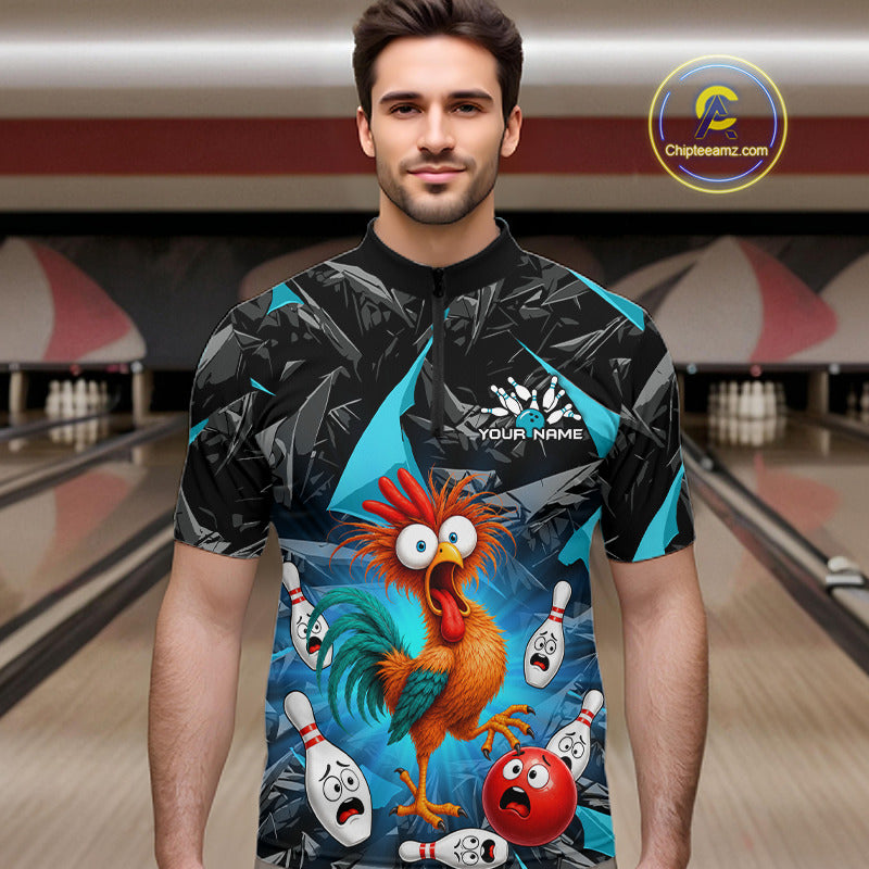 A man wearing a short-sleeve bowling jersey with a colorful cartoon rooster and bowling pins graphic, standing in front of a bowling alley background. The jersey has a black and teal geometric pattern on the upper chest and sleeves, with a large multicolor print on the lower front.