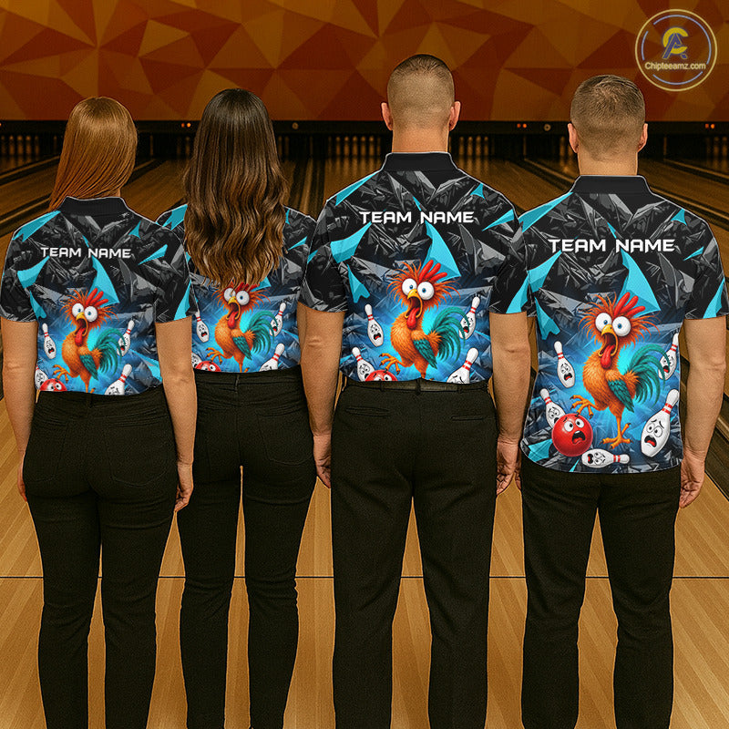Four people standing with their backs to the camera in a bowling alley, wearing matching dark blue and black bowling shirts with colorful cartoon rooster graphics and 'TEAM NAME' printed on the back.