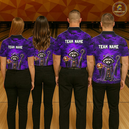 Four people standing with their backs to the camera in a bowling alley, wearing matching purple and black polo shirts with a Halloween raccoon graphic and 'TEAM NAME' printed on the back.