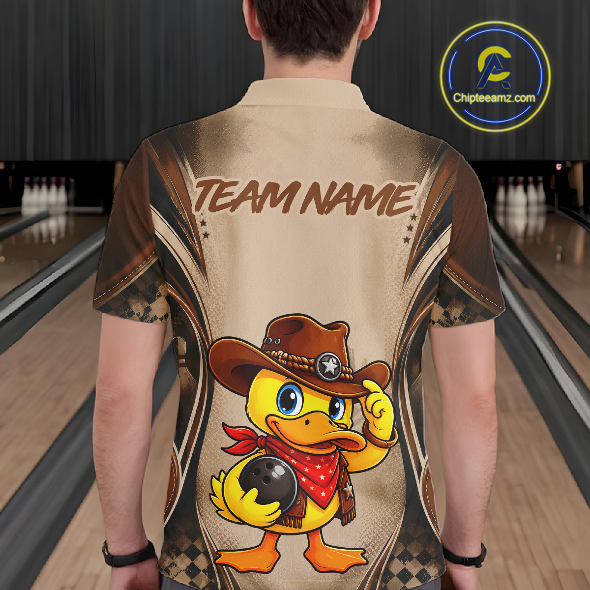 Person wearing a bowling shirt with a cartoon duck character and 'Team Name' text in a bowling alley.