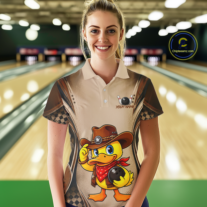 Person wearing a bowling shirt with a duck design in a bowling alley