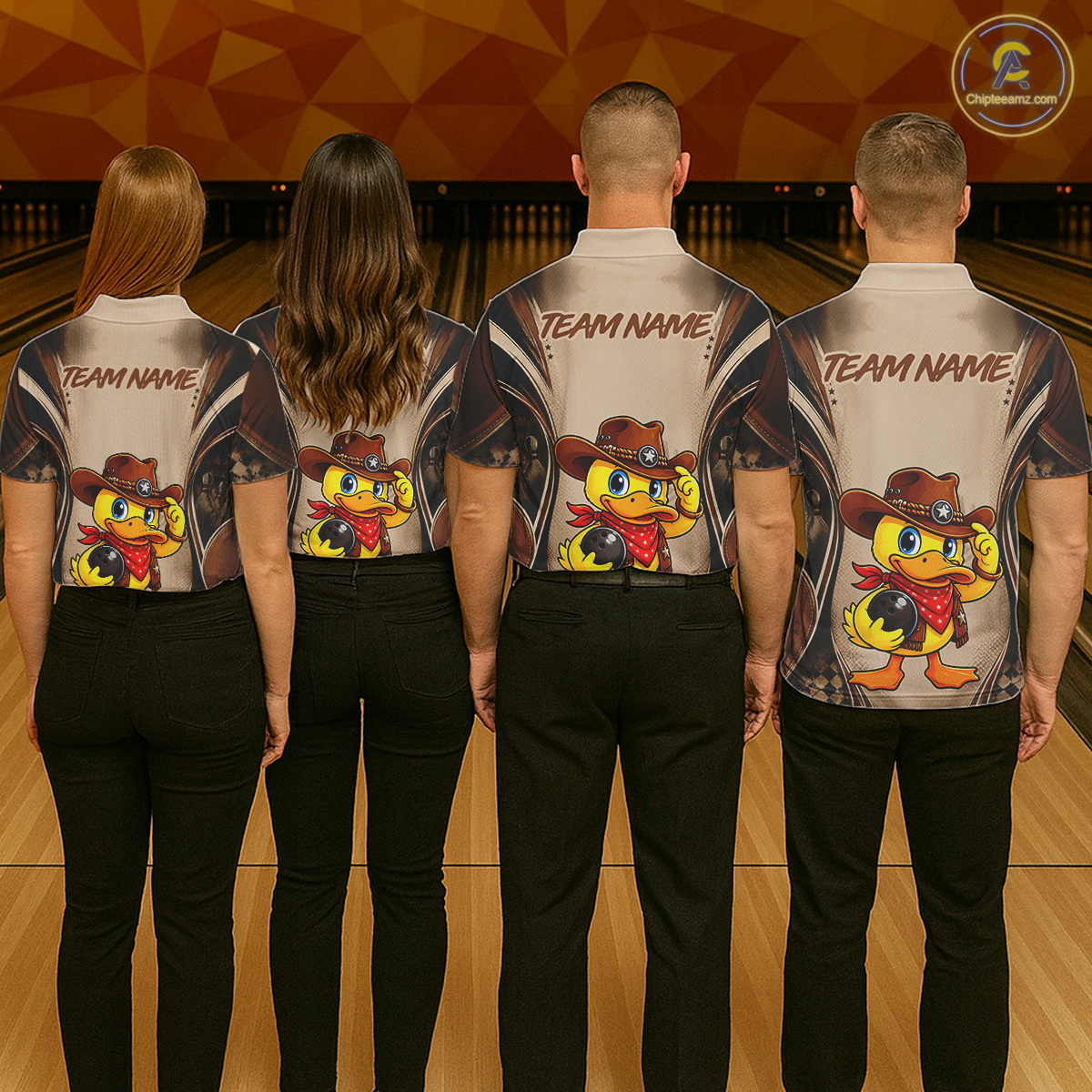 Four people wearing matching bowling shirts with a cartoon character design on a bowling alley.