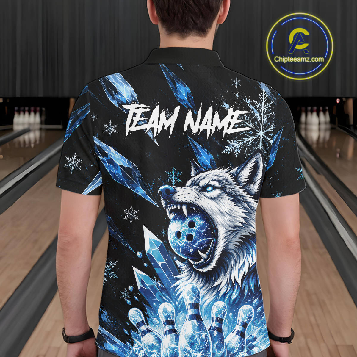 Person wearing a black bowling shirt with a wolf design and 'TEAM NAME' text in a bowling alley.
